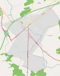 Mapa konturowa Zambrowa, na dole znajduje się punkt z opisem „Parafia pw. św. Józefa Rzemieślnika w Zambrowie”