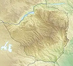 Mapa konturowa Zimbabwe, po lewej nieco u góry znajduje się punkt z opisem „Wodospady Wiktorii”