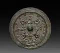 Lustro z brązu z przedstawieniem Xiwangmu. Wschodnia dynastia Jin. Cleveland Museum of Art